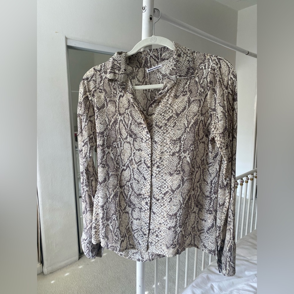 Reformation snake skin pattern button down blouse. Size small.